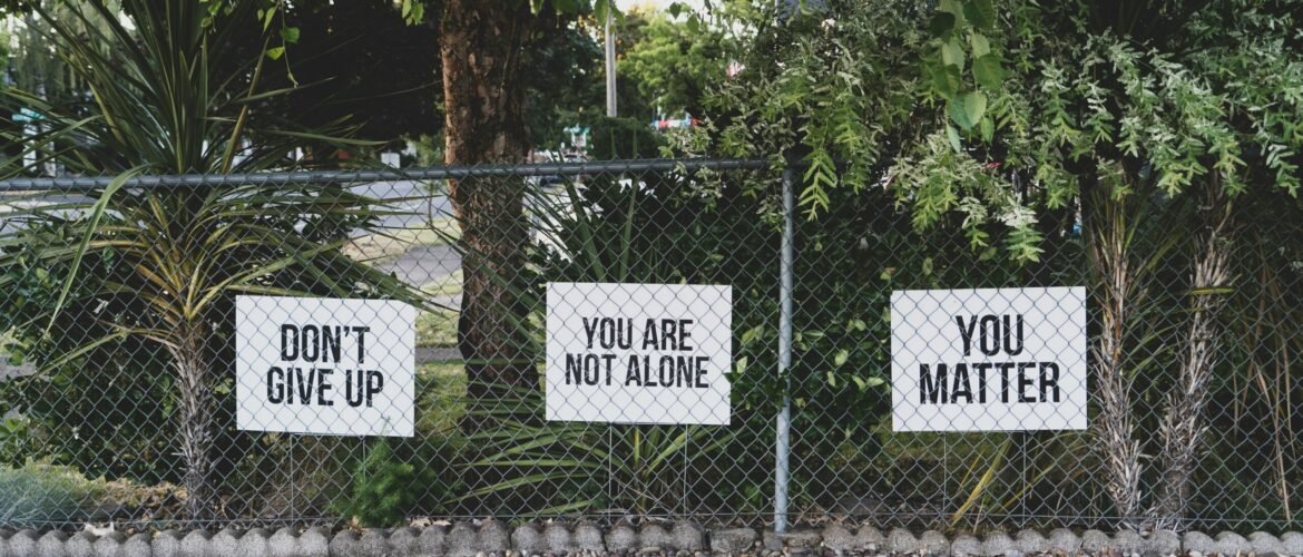 don't give up. You are not alone, you matter signage on metal fence